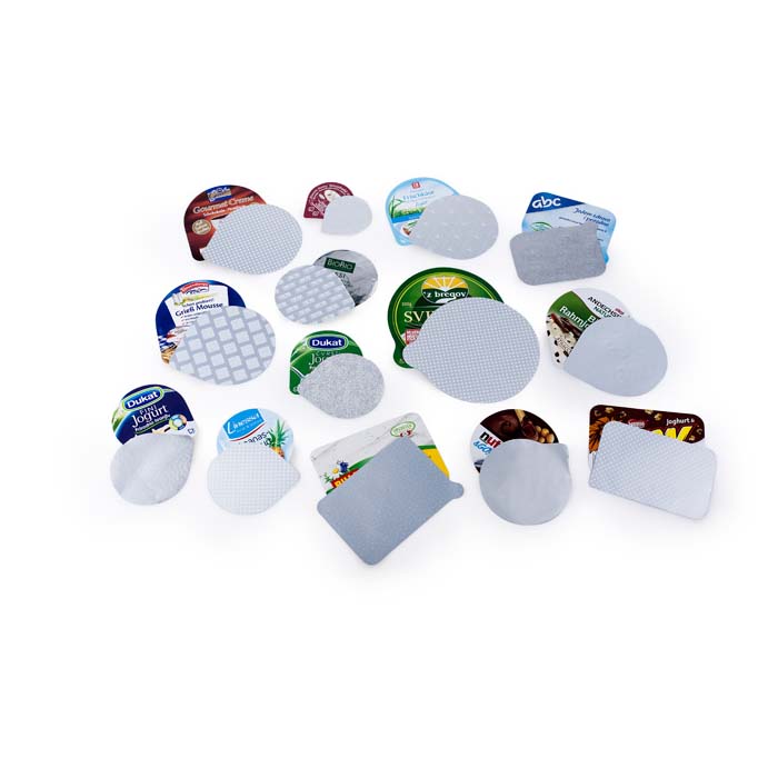 Heat-seal die cut lids and roll foil lids